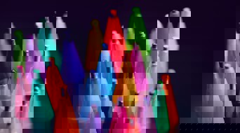 Colorful highlighters in various shades, standing upright and grouped in a circle.