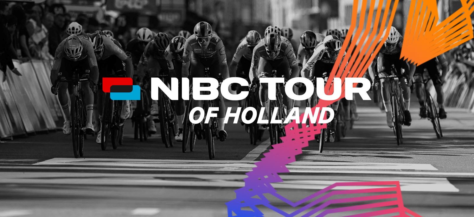  Cyclists in a peloton during the NIBC Tour of Holland, with the text 'NIBC TOUR OF HOLLAND' prominently displayed at the top.